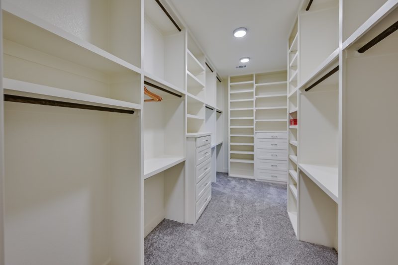 Design Considerations for Your Custom Home's Master Walk-In Closet